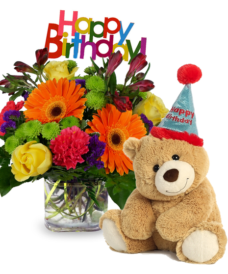 Cube filled with bright gerbera daisies, roses, carnations and more