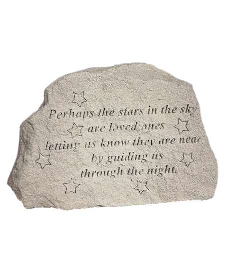 Image shows a stepping stone engraved with the message, 