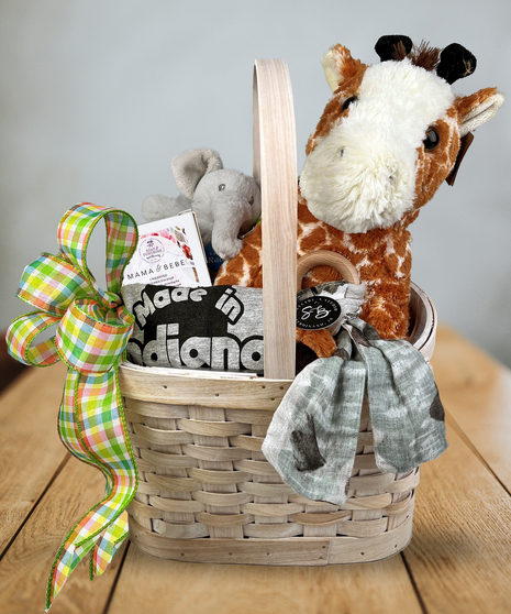 new baby gift basket with teether, seap, and onsie